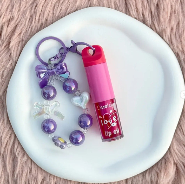 LOVE NADBEAUTY LIP OIL KEYCHAIN